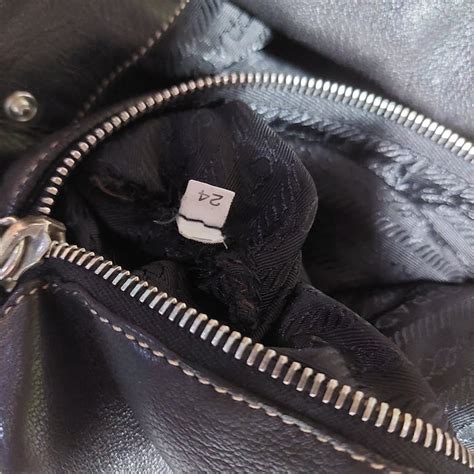 ipi zipper prada|Prada purse logo.